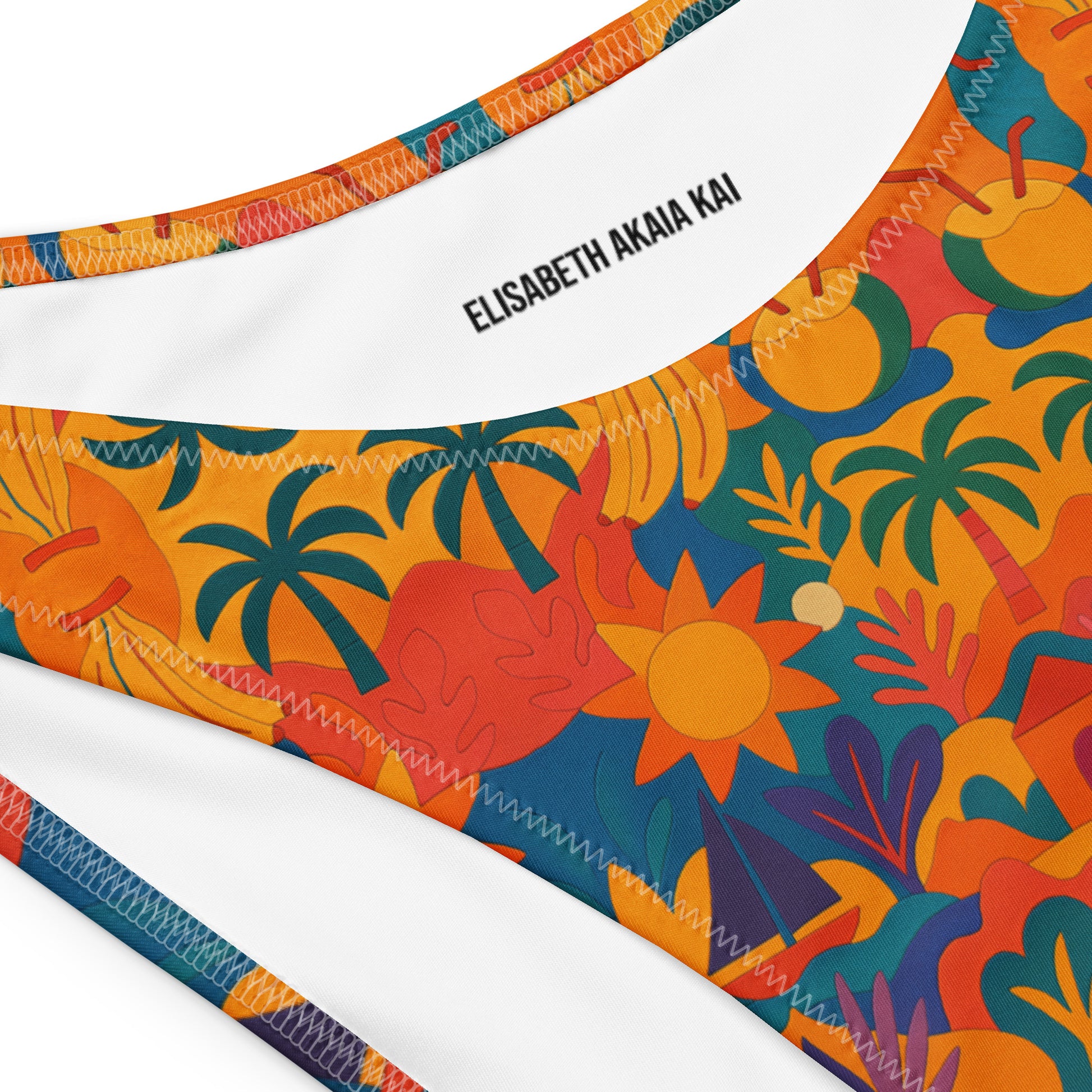 Détail du tissu intérieur du maillot Palma Áurea, couture renforcée et étiquette Elisabeth Akaïa Kaï – finition de qualité.