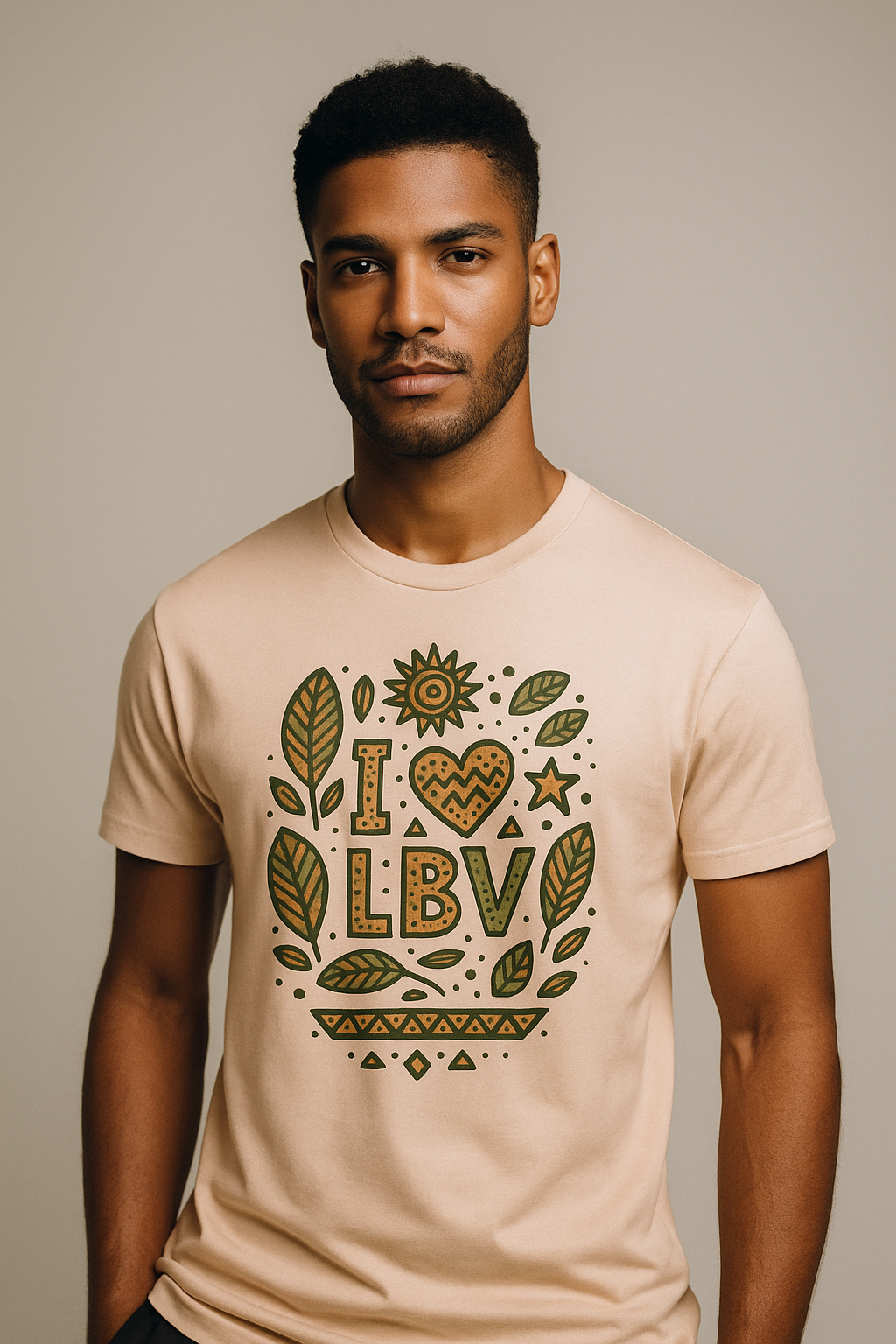 T-shirt pêche clair coton bio motif “I ❤ LBV” avec feuilles tropicales badamier stylisées – Afro Luxe.