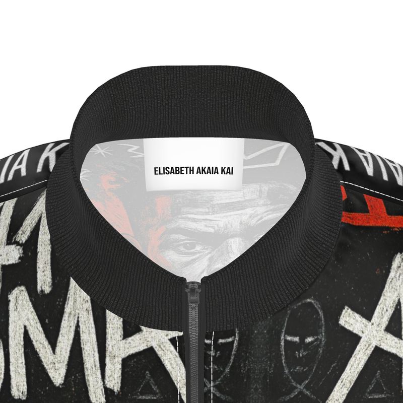 Veste streetwear de la collection Libreville Royale, imprimée de motifs tribaux rouges, noirs et blancs. Coupe unisexe avec fermeture zippée, symbole afro-luxe et esthétique urbaine artistique.