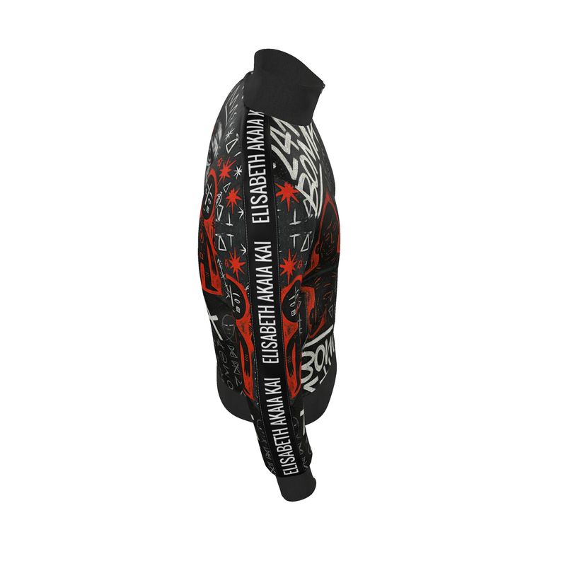 Veste streetwear de la collection Libreville Royale, imprimée de motifs tribaux rouges, noirs et blancs. Coupe unisexe avec fermeture zippée, symbole afro-luxe et esthétique urbaine artistique.
