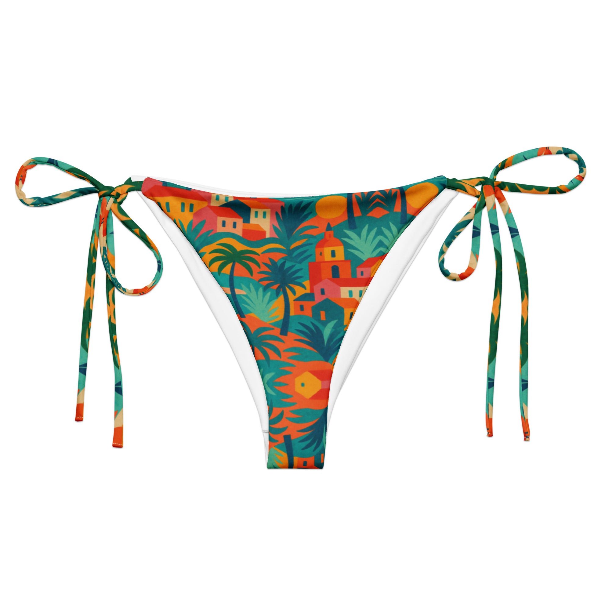 Bas de bikini triangle luxe Rêve Riviera en tissu recyclé, imprimé artistique inspiré de Saint-Tropez, présenté sur un lit de plage avec accessoires élégants.
