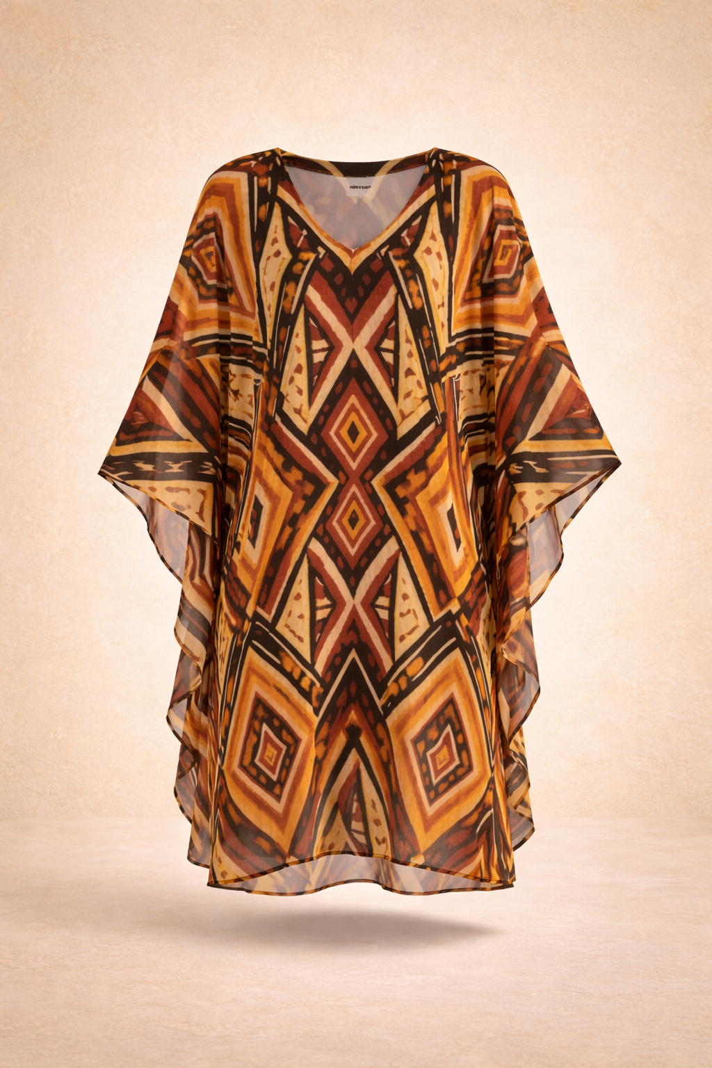 Caftan court NYARA en version e-commerce : coupe fluide, imprimé signature et finitions premium. Une pièce idéale pour une allure élégante et moderne.