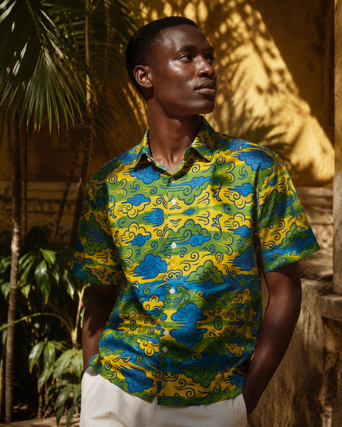 Découvrez une chemise homme haut de gamme au design artistique exclusif Élisabeth Akaïa Kaï. Une création solaire mêlant héritage culturel et élégance contemporaine.