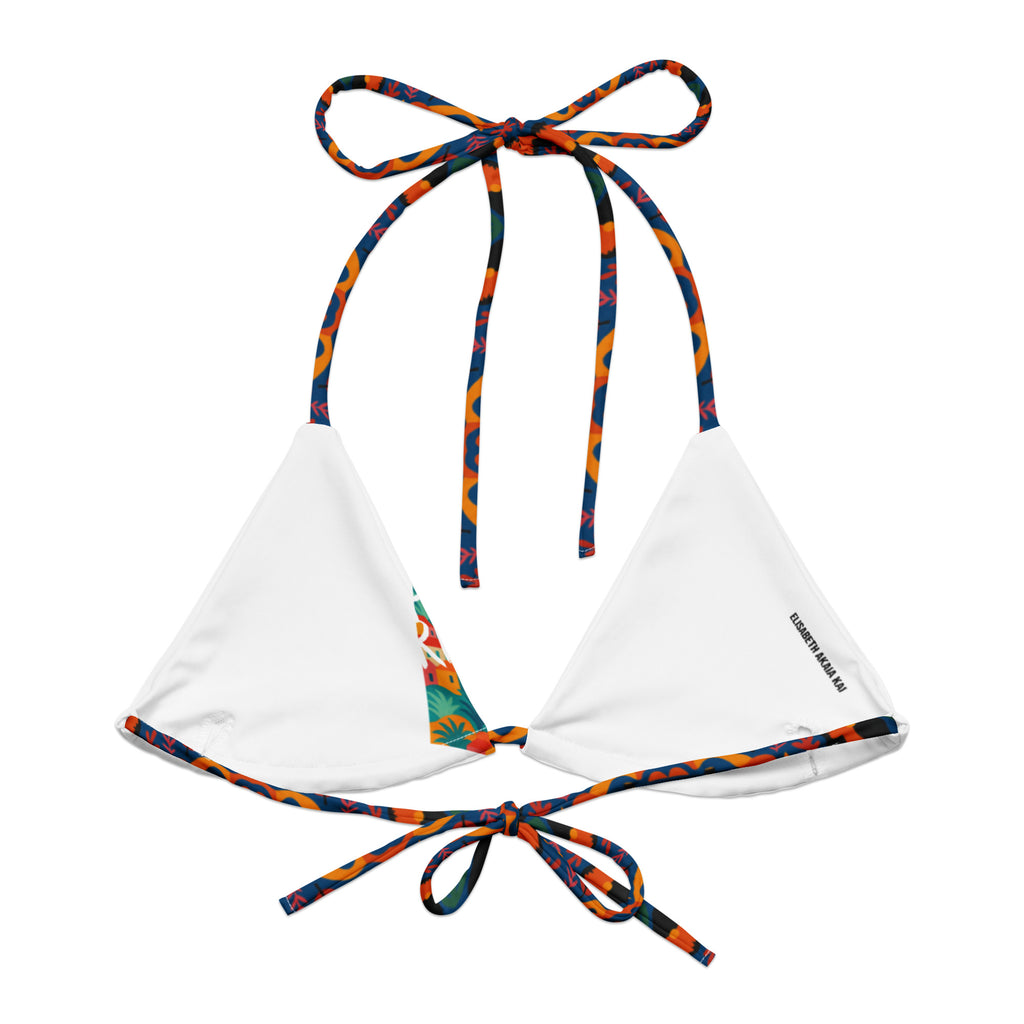 Zoom sur l’imprimé coloré et multiculturel du bikini Isla Sol, tissu doux en polyester recyclé, inspiration solaire et afro-méditerranéenne