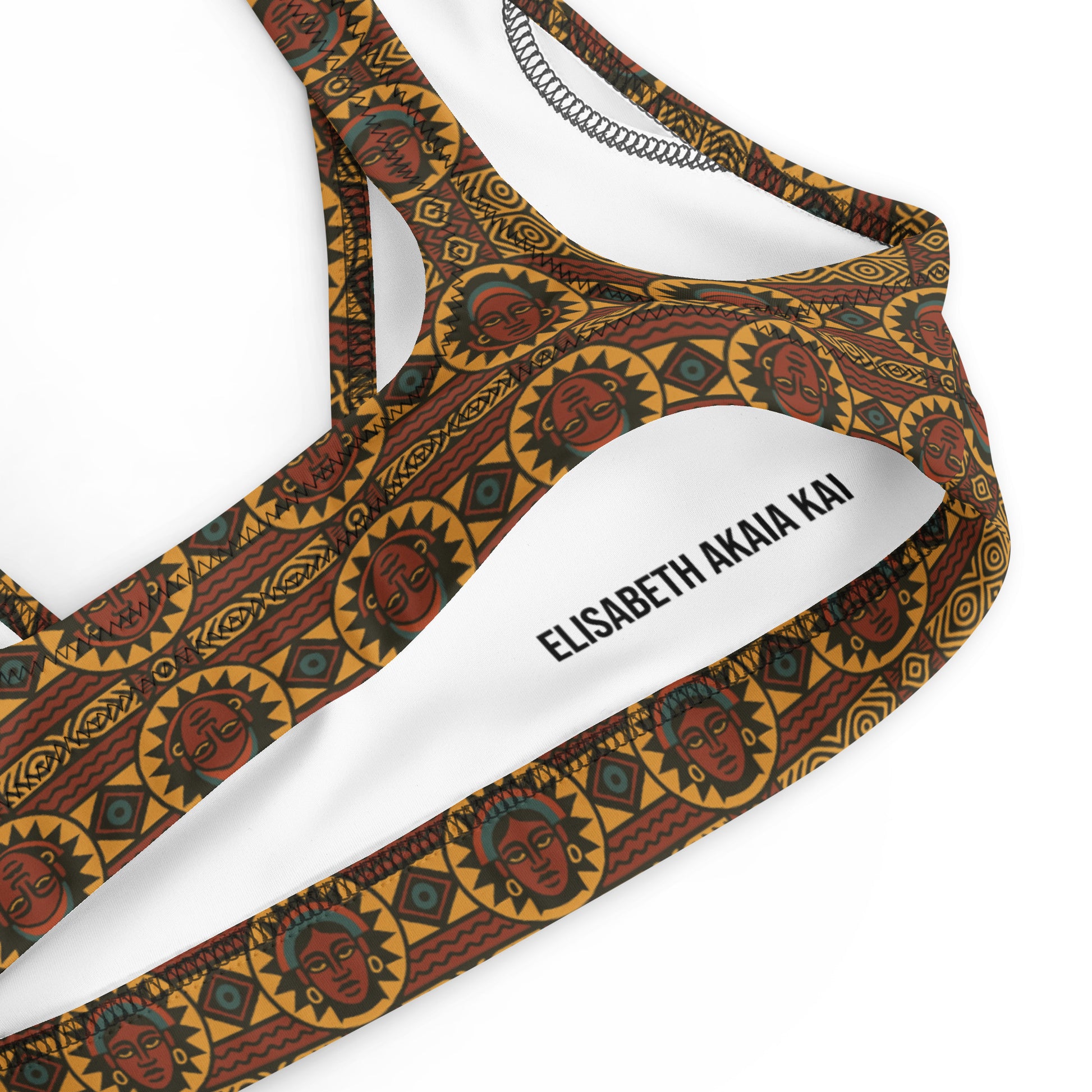 Haut de bikini rembourré en polyester recyclé Kaya Lumina, imprimé afro contemporain aux motifs solaires dorés, rouges et noirs, coupe élégante avec encolure plongeante, créé pour une clientèle afro-luxe et voyageuse