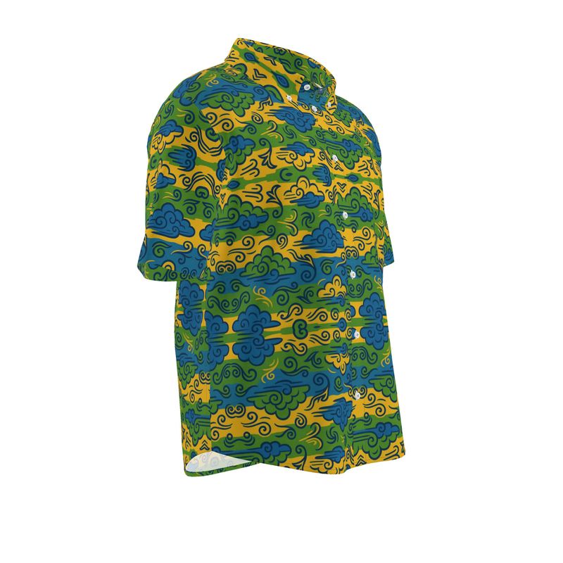 Le motif bleu-vert-or s’étire dans un équilibre parfait. Une vision contemporaine du vent gabonais, tissée dans la fibre du tissu.