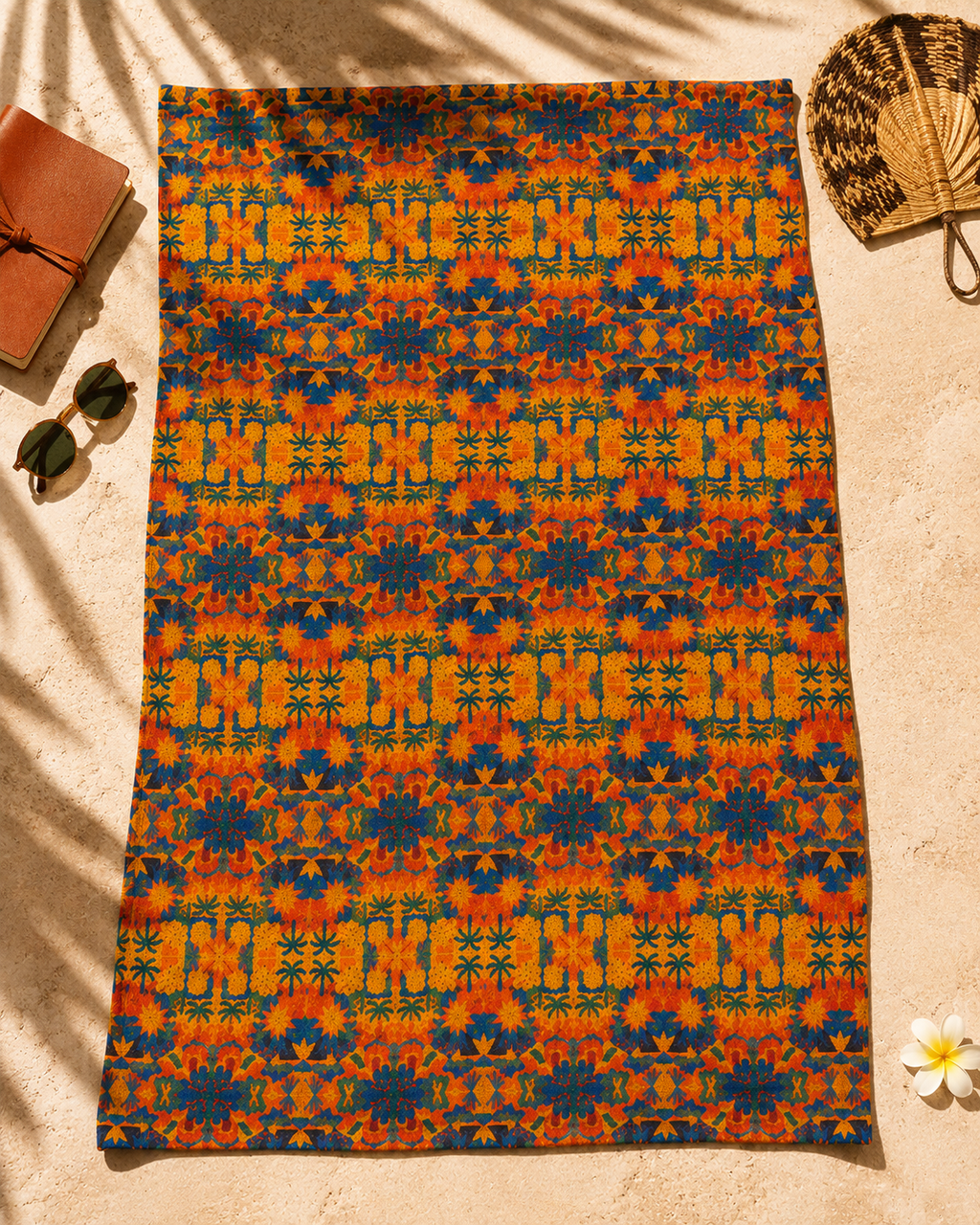 Vue complete du pagne Palma Aurea deploie sur une surface naturelle. Son motif exclusif et ses couleurs lumineuses en font une oeuvre textile ideale pour la couture et la creation de mode.