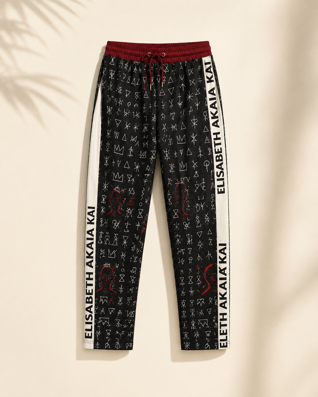 Le pantalon Boma associe une esthétique graphique unique à une coupe moderne et élégante. Une pièce emblématique du prêt-à-porter afro-luxe contemporain.