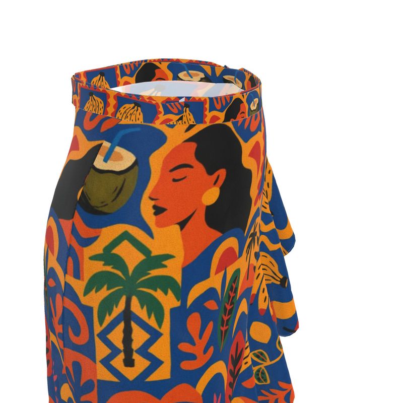 Jupe portefeuille Isla Sol signée Élisabeth Akaïa Kaï, en crêpe fluide imprimé, coupe bohème chic avec volants et ceinture nouée, disponible en version courte ou midi.