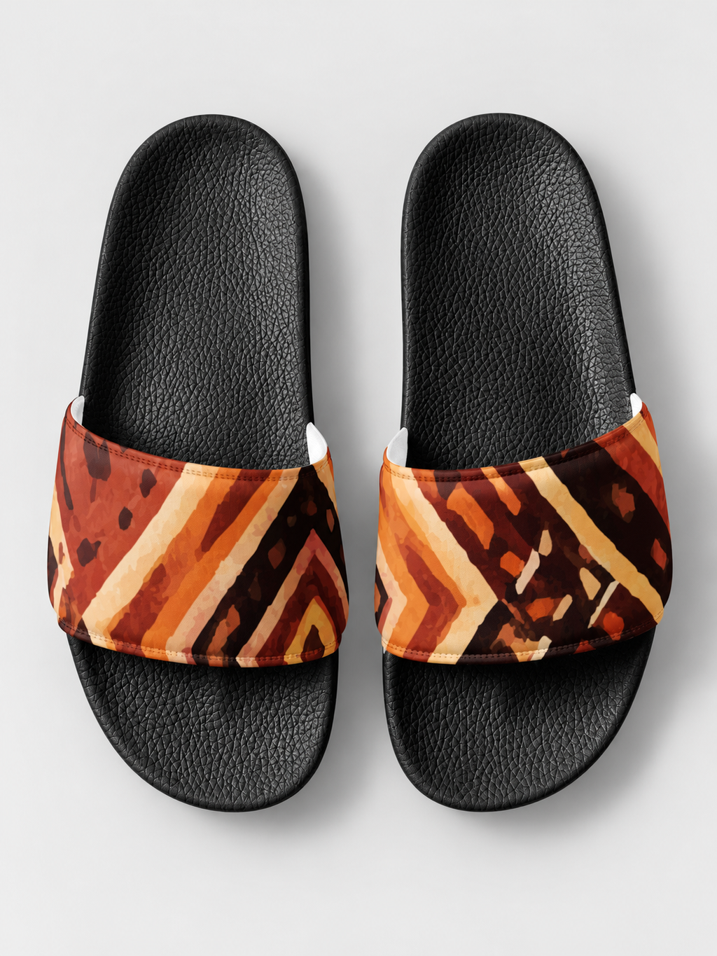 Vue du dessus des claquettes homme NYARA à semelle noire et imprimé artistique.